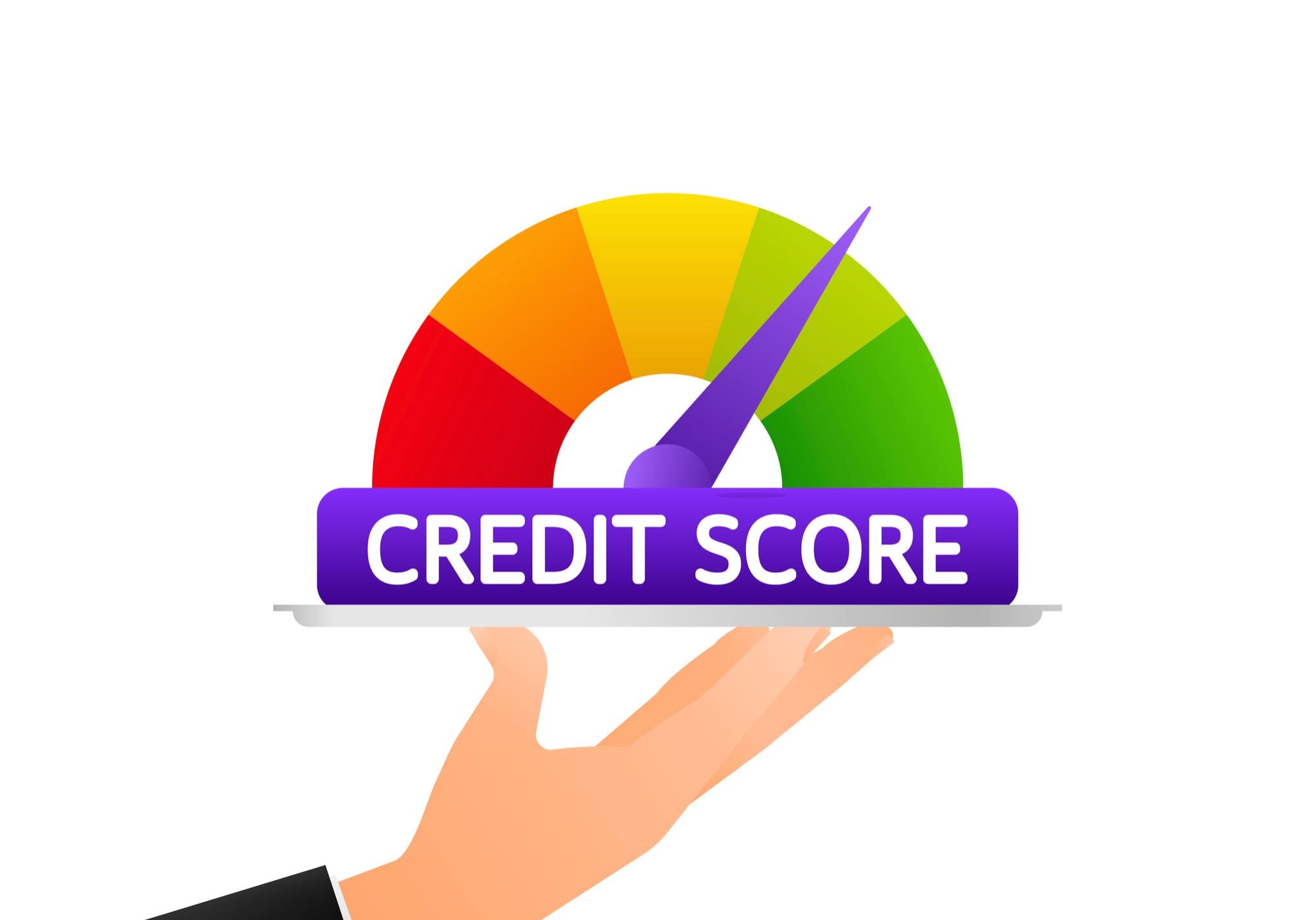 Hand holding credit score gauge