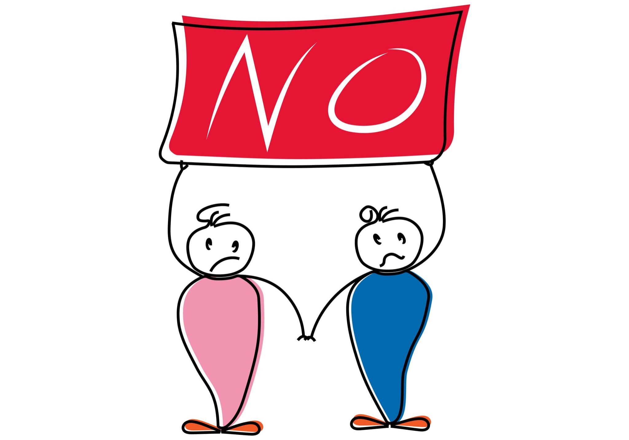 Two sad figures holding hands under NO sign