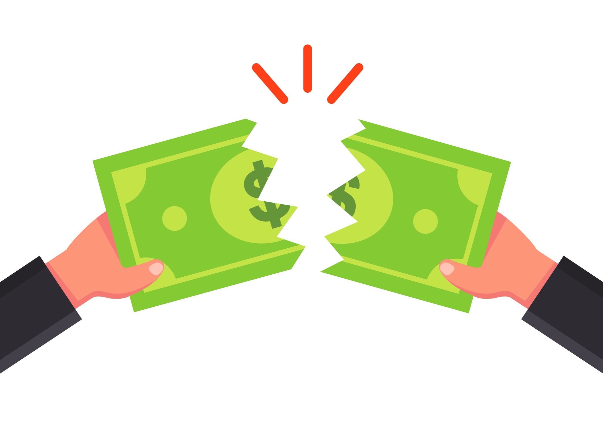 Hands tearing a dollar bill in half
